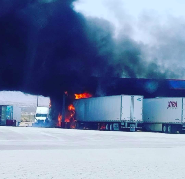 Two semi trucks burn at TA truck stop fuel pumps 