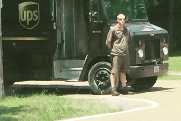 UPS driver pulls over to pay respect to fallen police officer