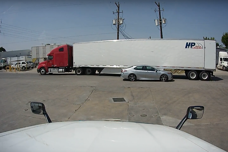 VIDEO: Is the car driver at fault for letting the trucker hit him?