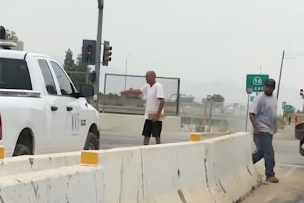 VIDEO: Police say that a pedestrian started this fist fight, but the truck driver clearly ended it.