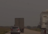 Motorist shares video of erratic truck driver, company blames wind