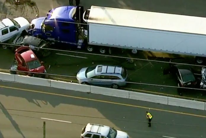 Authorities say that ten people were injured yesterday when a semi truck crashed into numerous vehicles waiting at a traffic light during the evening rush hour in Edison, New Jersey.