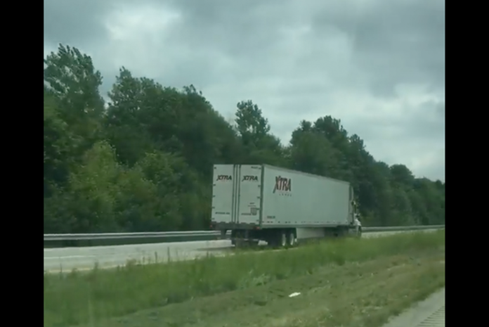 VIDEO-Trucker goes the wrong way on I-69