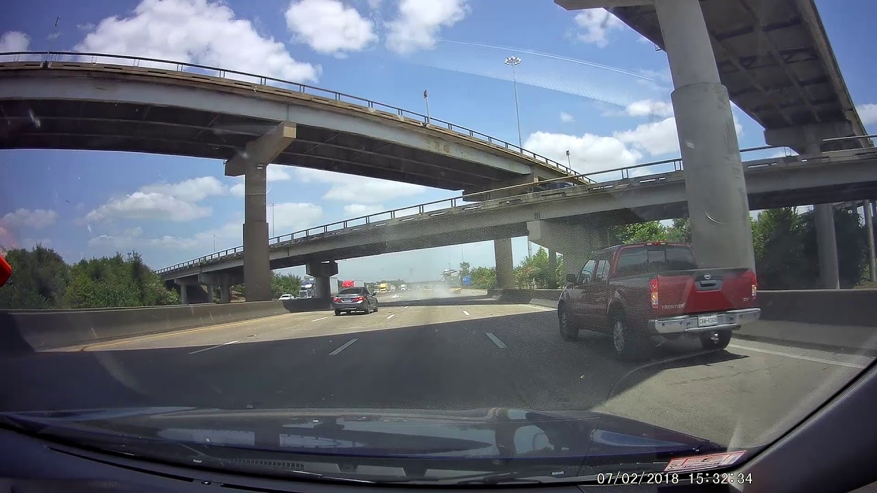 VIDEO: Truck with oversized load clobbers Houston overpasses