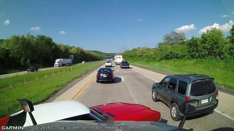 VIDEO: Oldsmobile driver gets a lesson in merging courtesy of truck driver