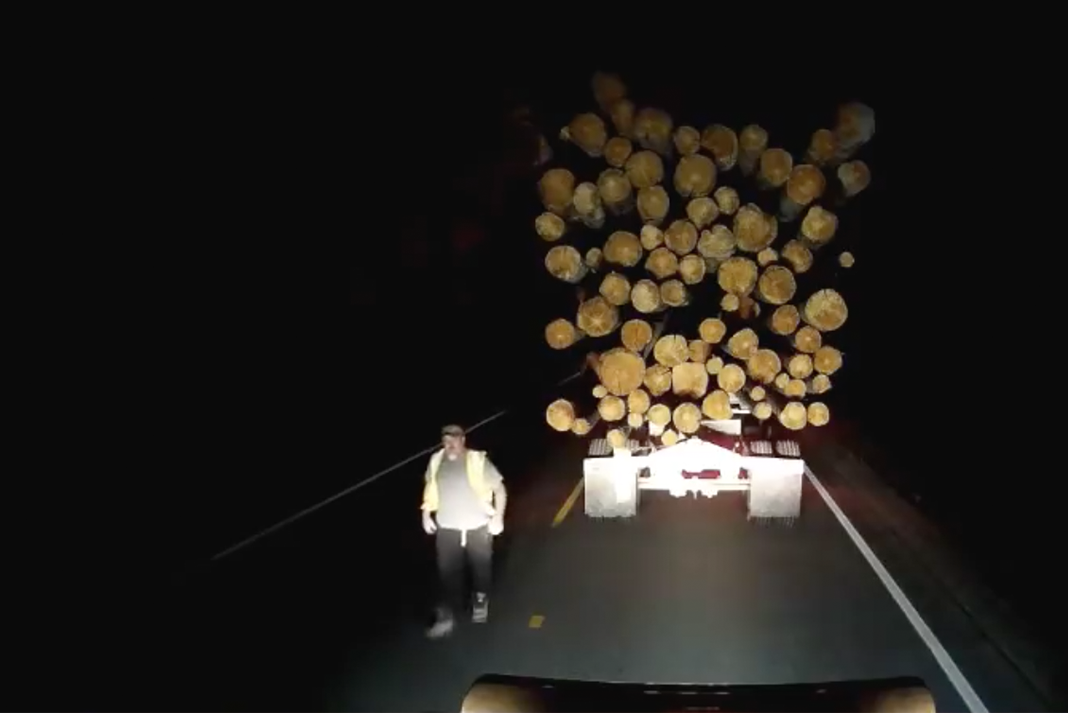 VIDEO: Log truck driver kicks the heck out of another driver’s truck