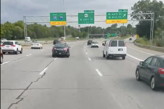 VIDEO- Trucker films Cleveland cop straddling two lanes