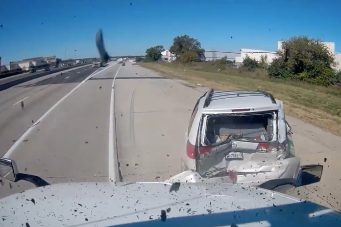 VIDEO- Bungee cord blamed for two semi truck, four car crash