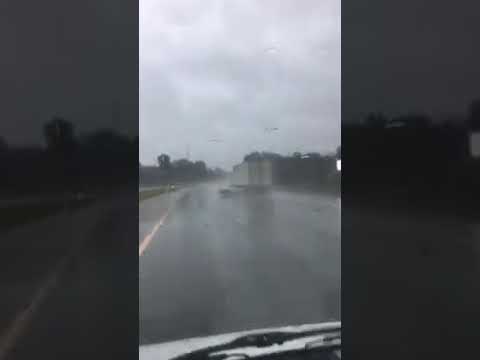 VIDEO: Semi truck drags car down North Carolina roadway