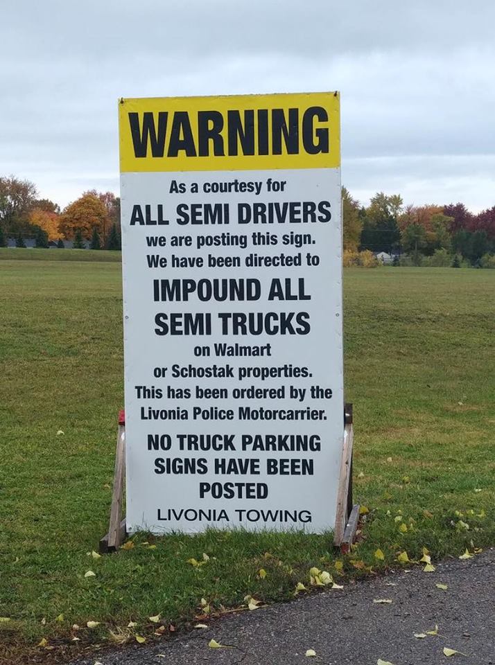 Sign posted on Walmart parking lot warns truckers to 'get out'