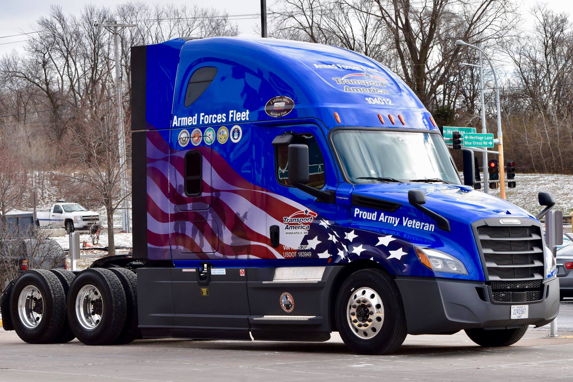 Trucking company honors driver with custom-designed truck to commemorate military service