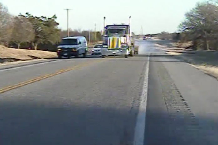 Trucker passing illegally nearly hits trooper head on