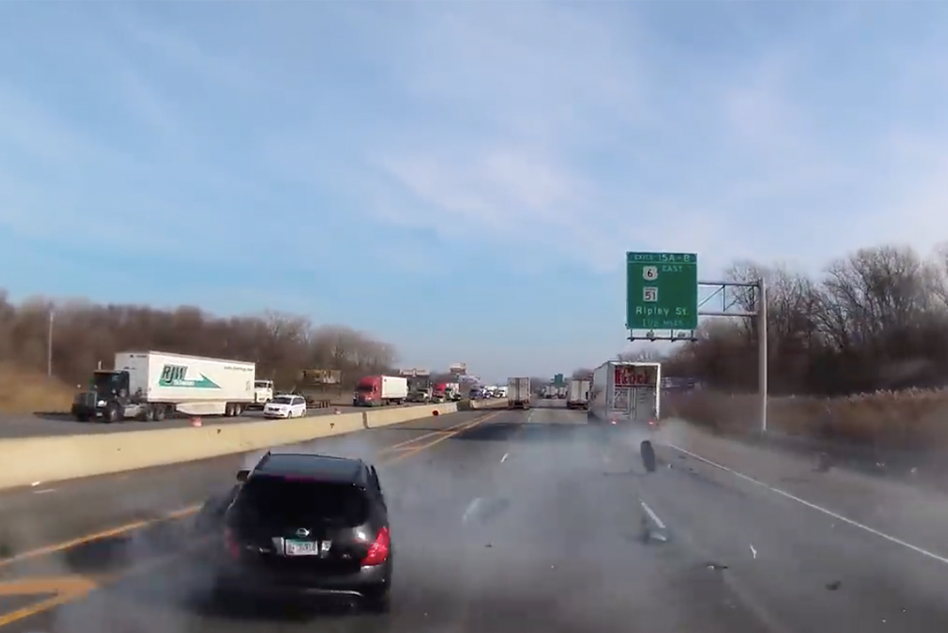 Watch: SUV driver ignores lane end sign, gets "instant karma"