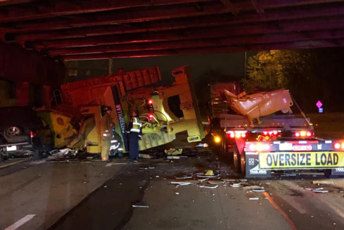Interstate closed all day for truck driver's bridge vs. bulldozer blunder