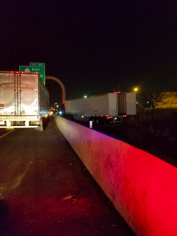 Medical emergency to blame after trucker crashes off highway into overhead sign support