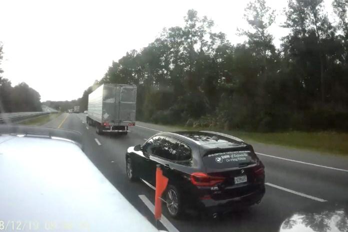 See a clueless BMW driver pay the price for a no-look lane change -- from three different angles