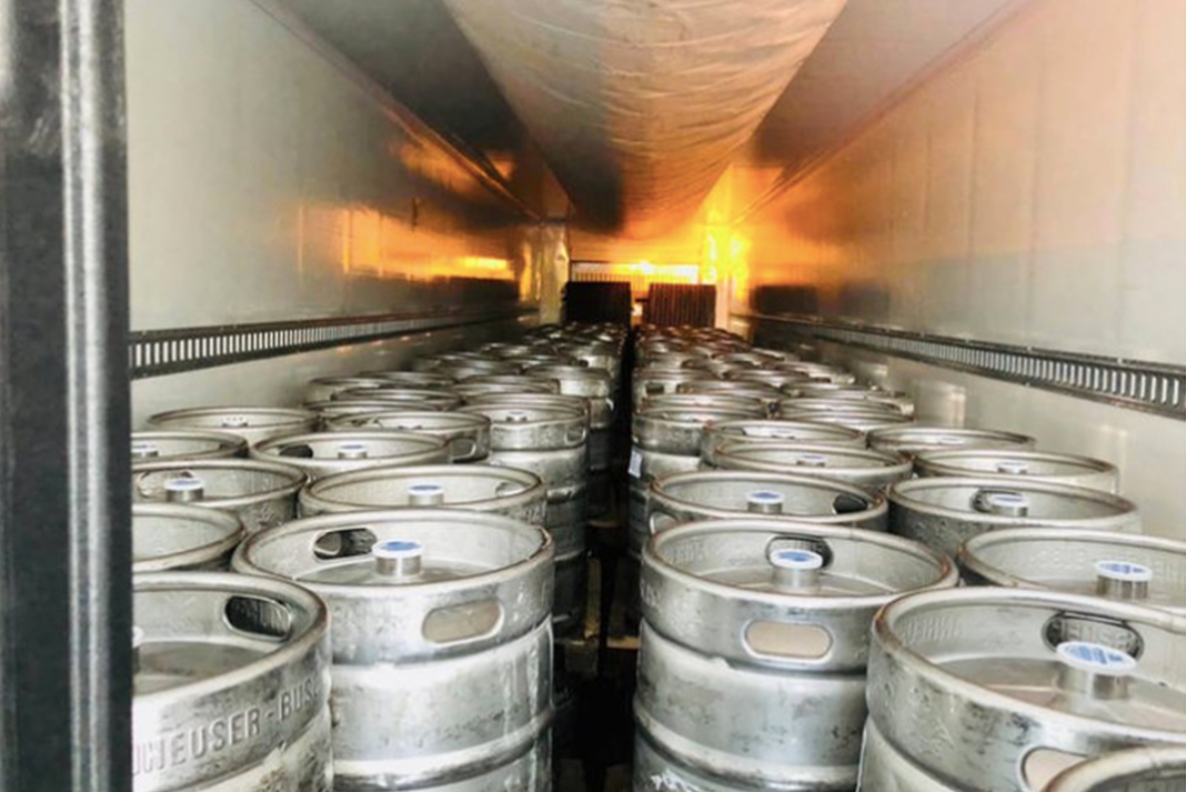 Trucker and beer load go missing.  Cops find load, but not driver.