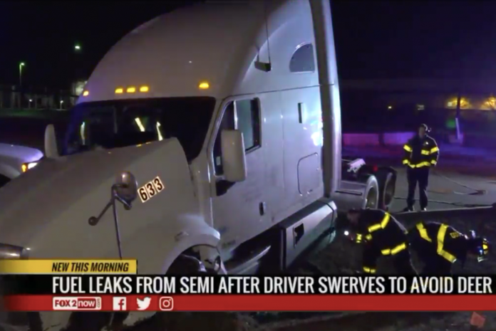 Trucker crashes into curb after swerving to avoid deer