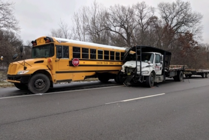 Troopers say driver was removing shirt during deadly crash with school bus