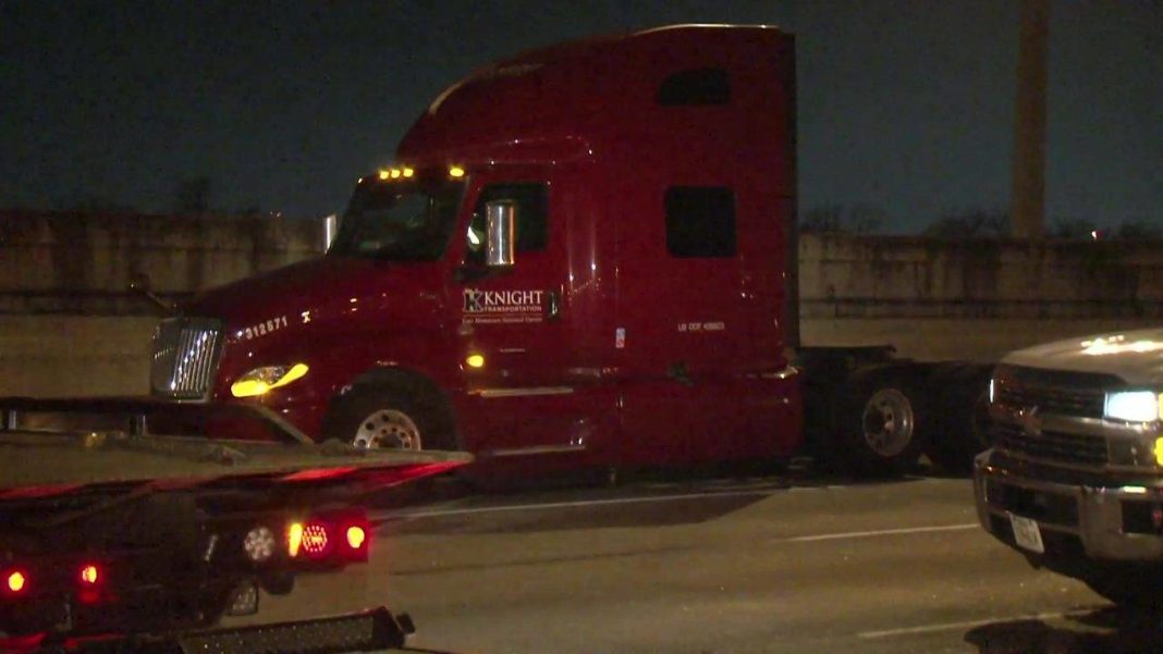 22yearold leaves car, jumps in front of semi truck on interstate