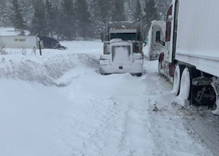 A group of truckers has been stuck on a snowy highway since Monday