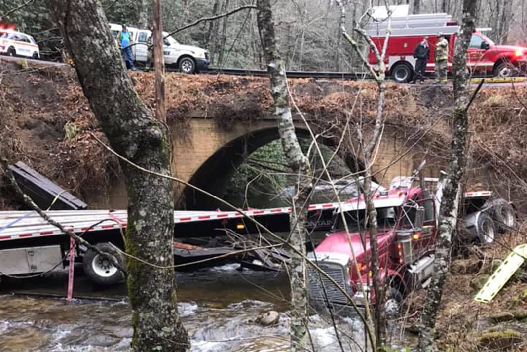 Trucker takes on restricted mountain route, winds up in creek