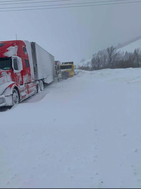 A group of truckers has been stuck on a snowy highway since Monday