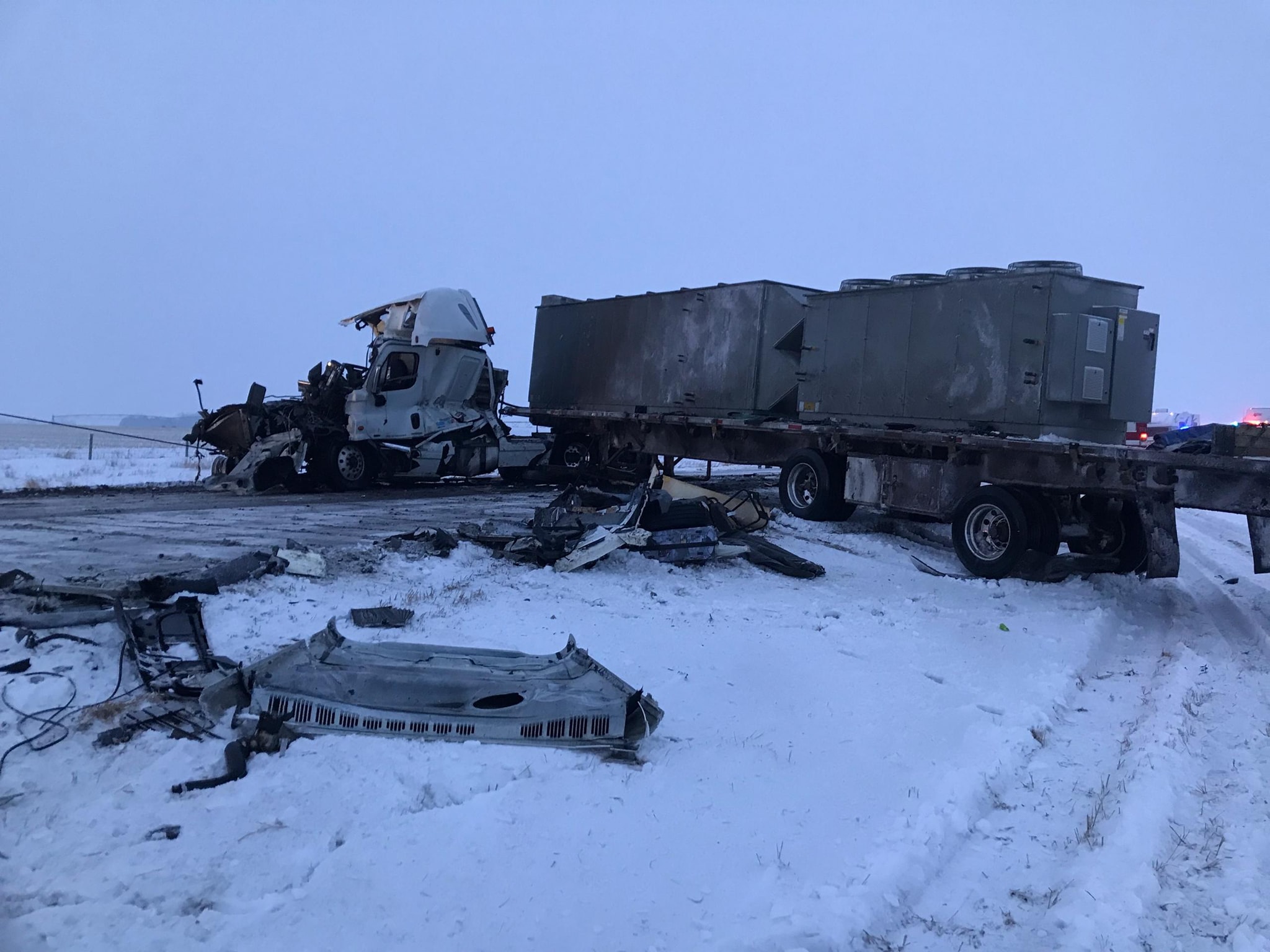 Troopers say no injuries after serious multi-truck crash
