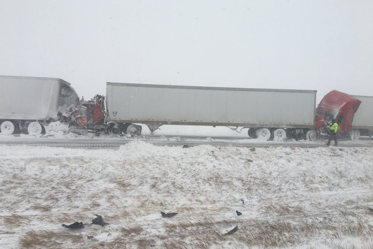 Police say more than 100-vehicles involved in icy highway pileup