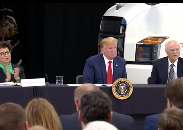 Trump pays visit to Minnesota truck dealership