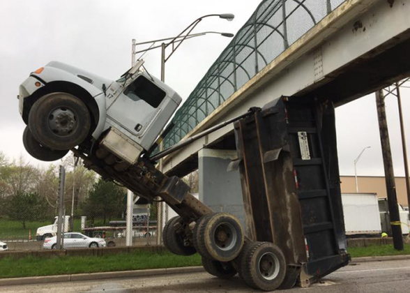 Dump Truck Caught On Camera Striking Pedestrian Bridge