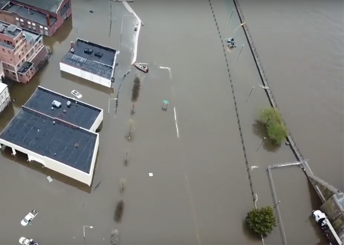 Levee breach leaves Iowa city under 6 feet of water