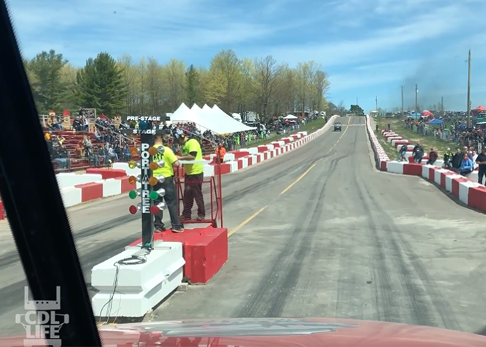 Burn some rubber with this big rig drag race ride along video