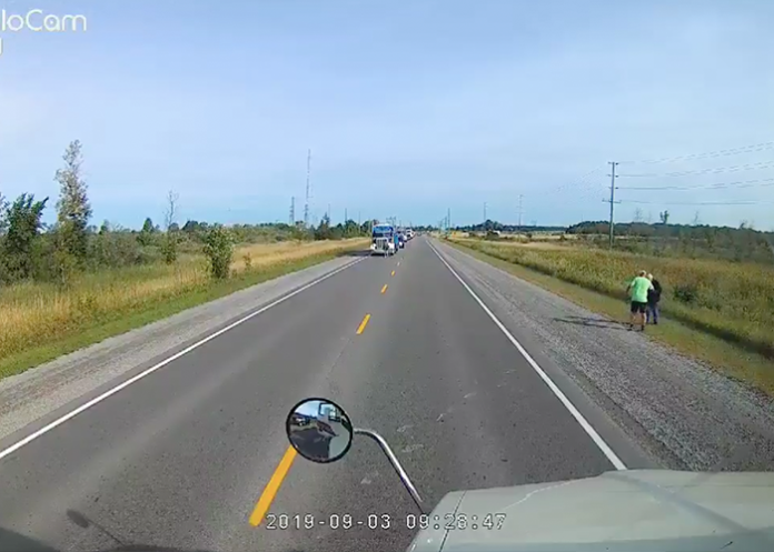 Two Truckers Help Old Man