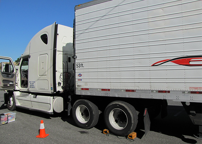 Police find $2.4 million in drugs in a semi truck, arrest 11 in major long haul drug ring