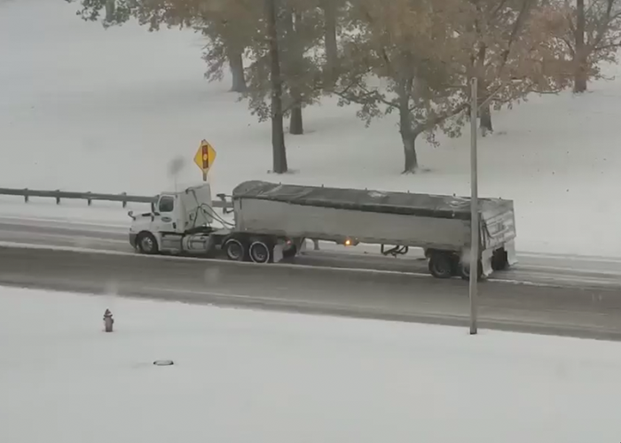 Truck driver is no match for icy hill