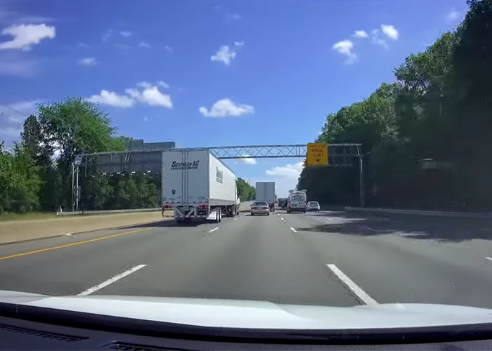 Tailgating car driver learns why you don’t camp in a trucker’s blind spot