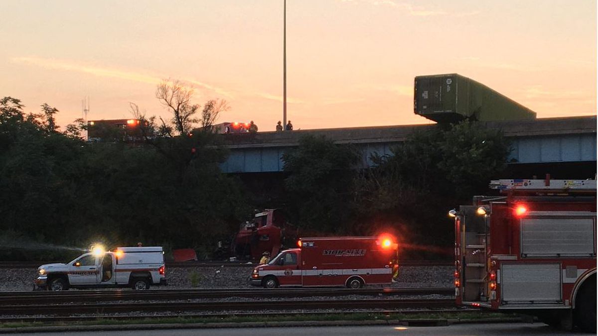 Trucker survives 30-foot drop onto railroad tracks following crash with high-speed motorist