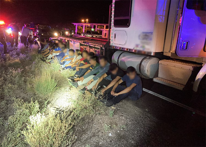 Two teenagers caught smuggling 23 immigrants in semi truck