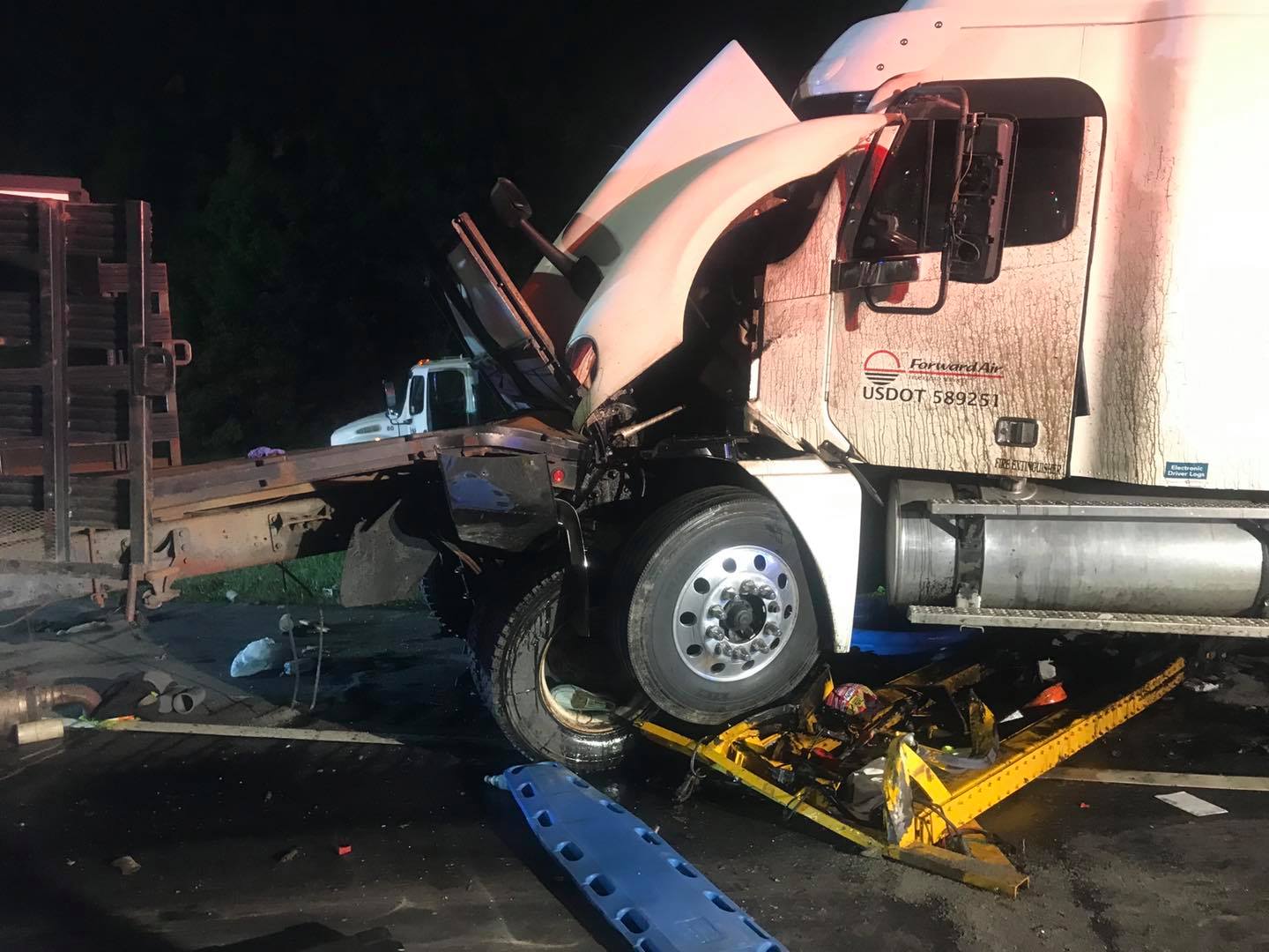 One dead in early morning crash involving construction vehicles in