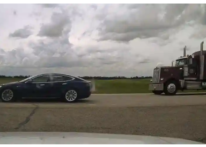 Tesla driver speeds past semi while asleep with seats 'completely reclined'