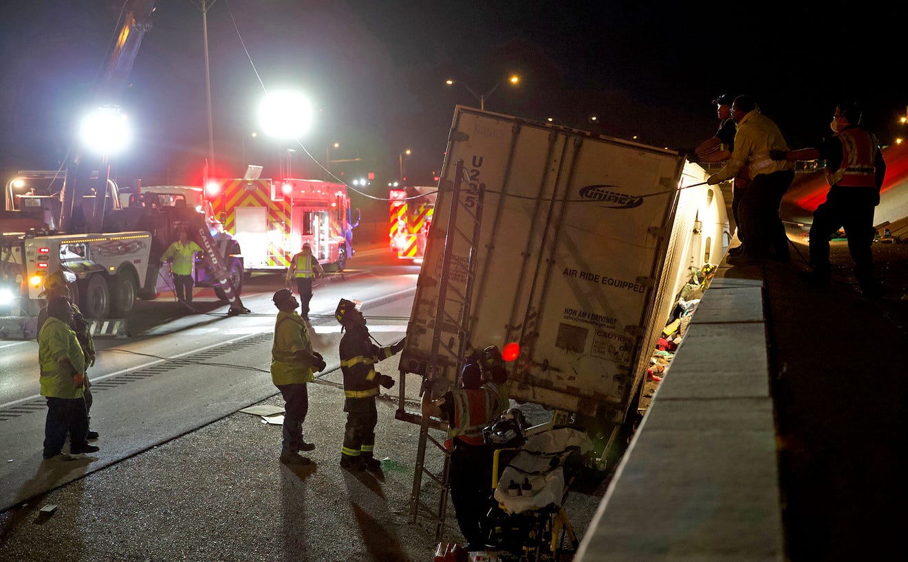 ‘She slammed on her brakes, she slammed on her brakes’ cried trucker involved in wreck that pinned motorist for hours