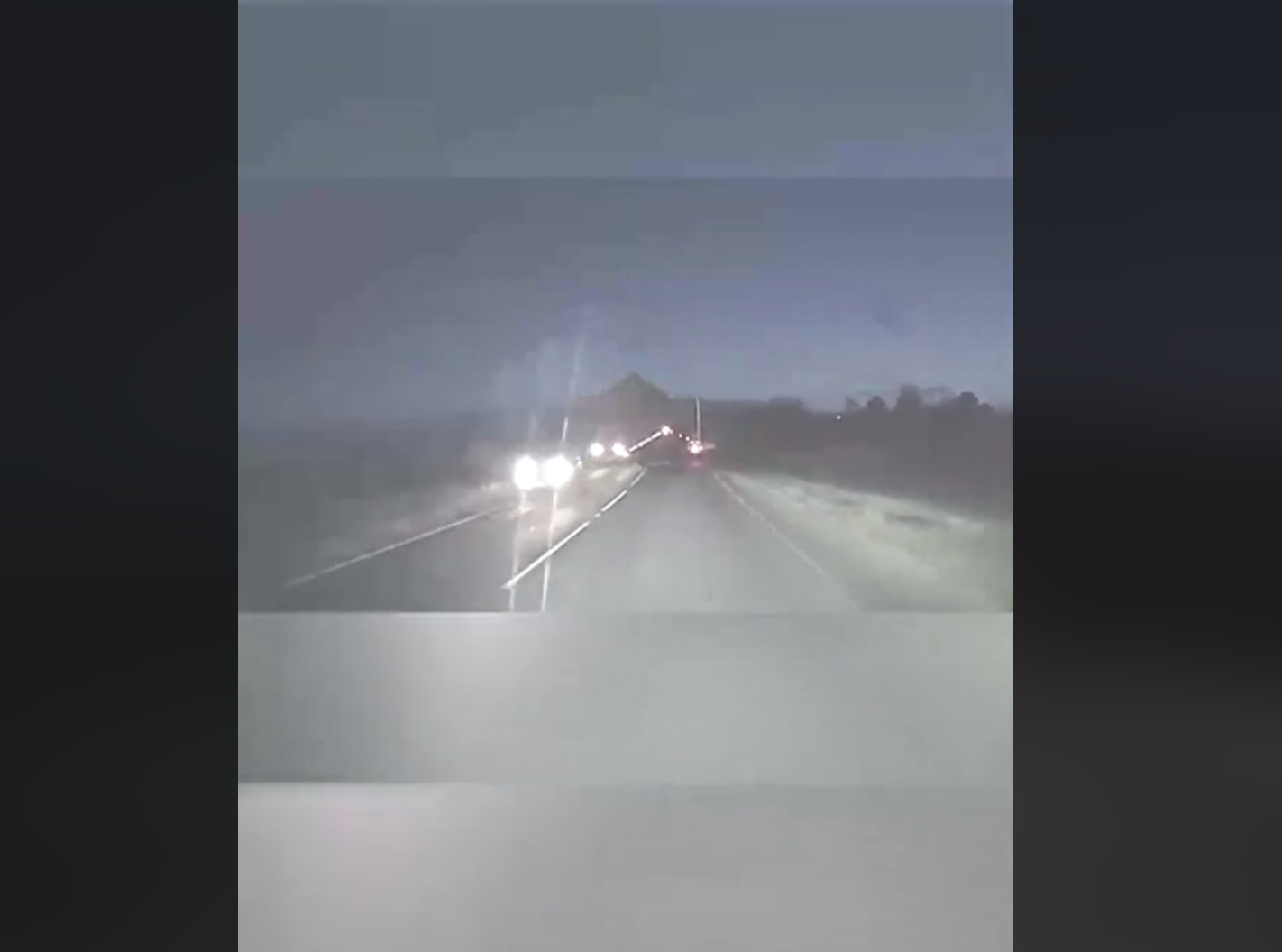 VIDEO: Tipping trailer causes crazy close call for car drivers