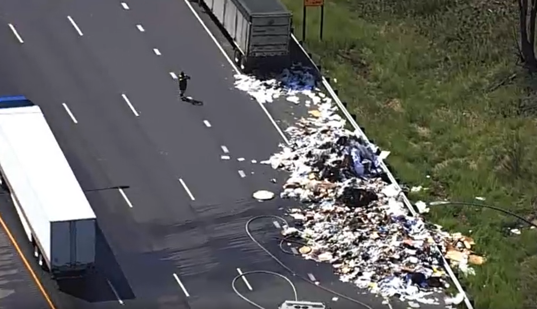 Driver Dumps Blazing Garbage In Middle Of Highway 9987