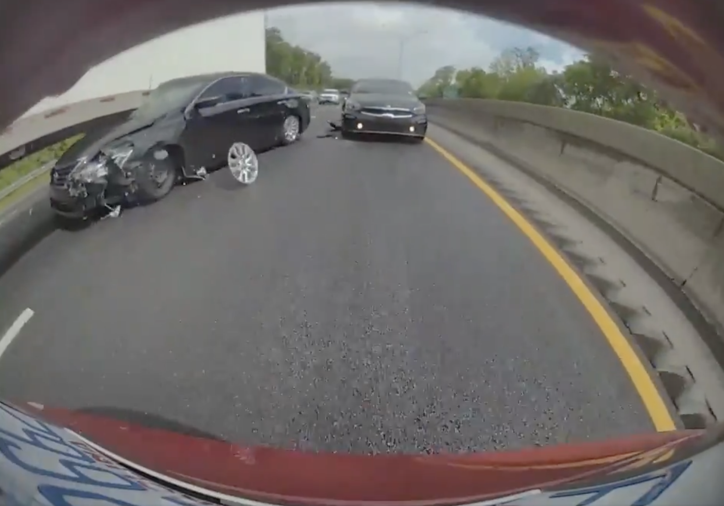 VIDEO: Nissan crashes into car, under semi trailer, in slowing traffic