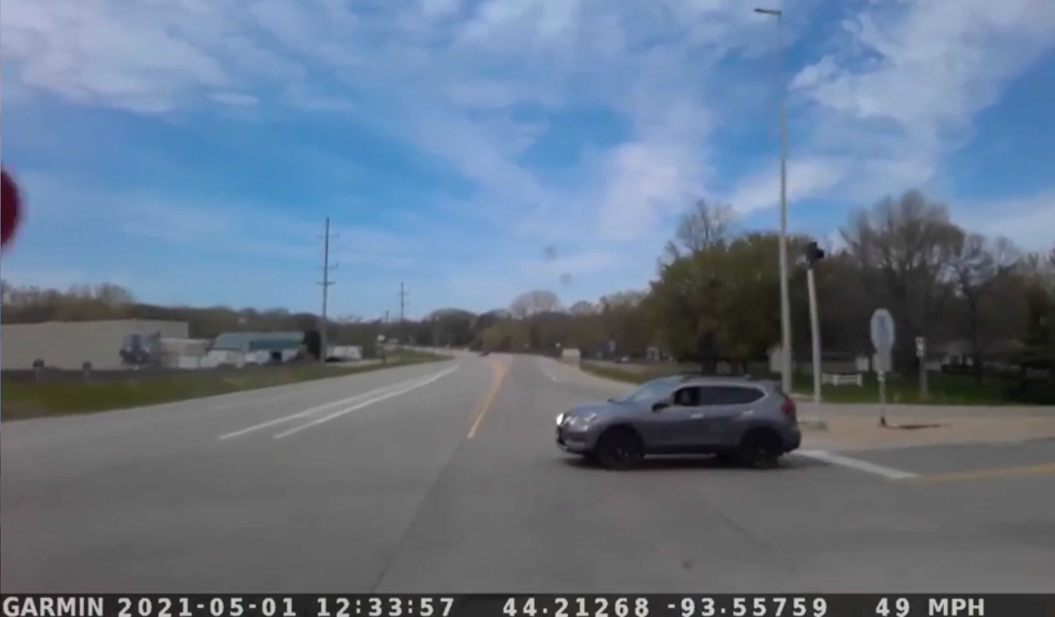 VIDEO: Motorist fails to see a bright red Freightliner with the right-of-way