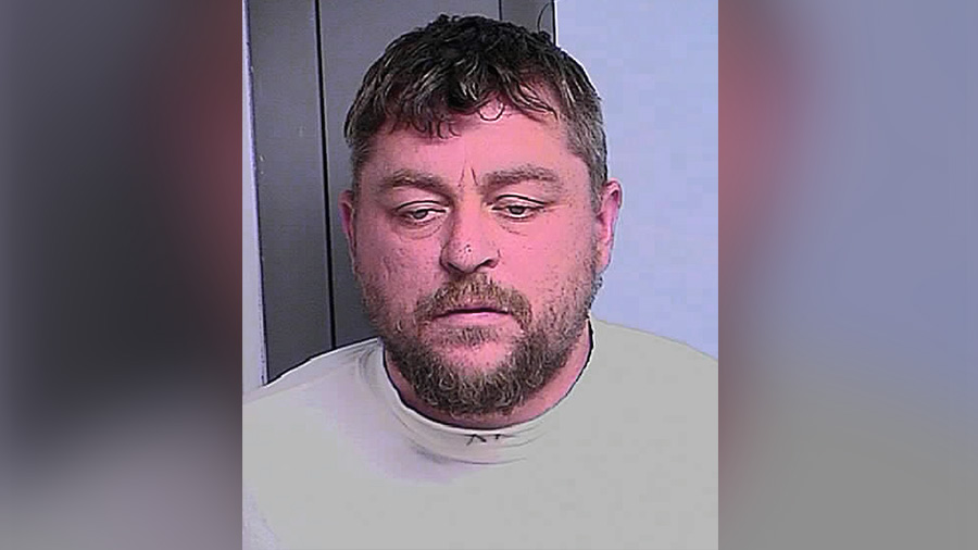 Man threatens trucker with gun, chokes police K9 while fleeing scene