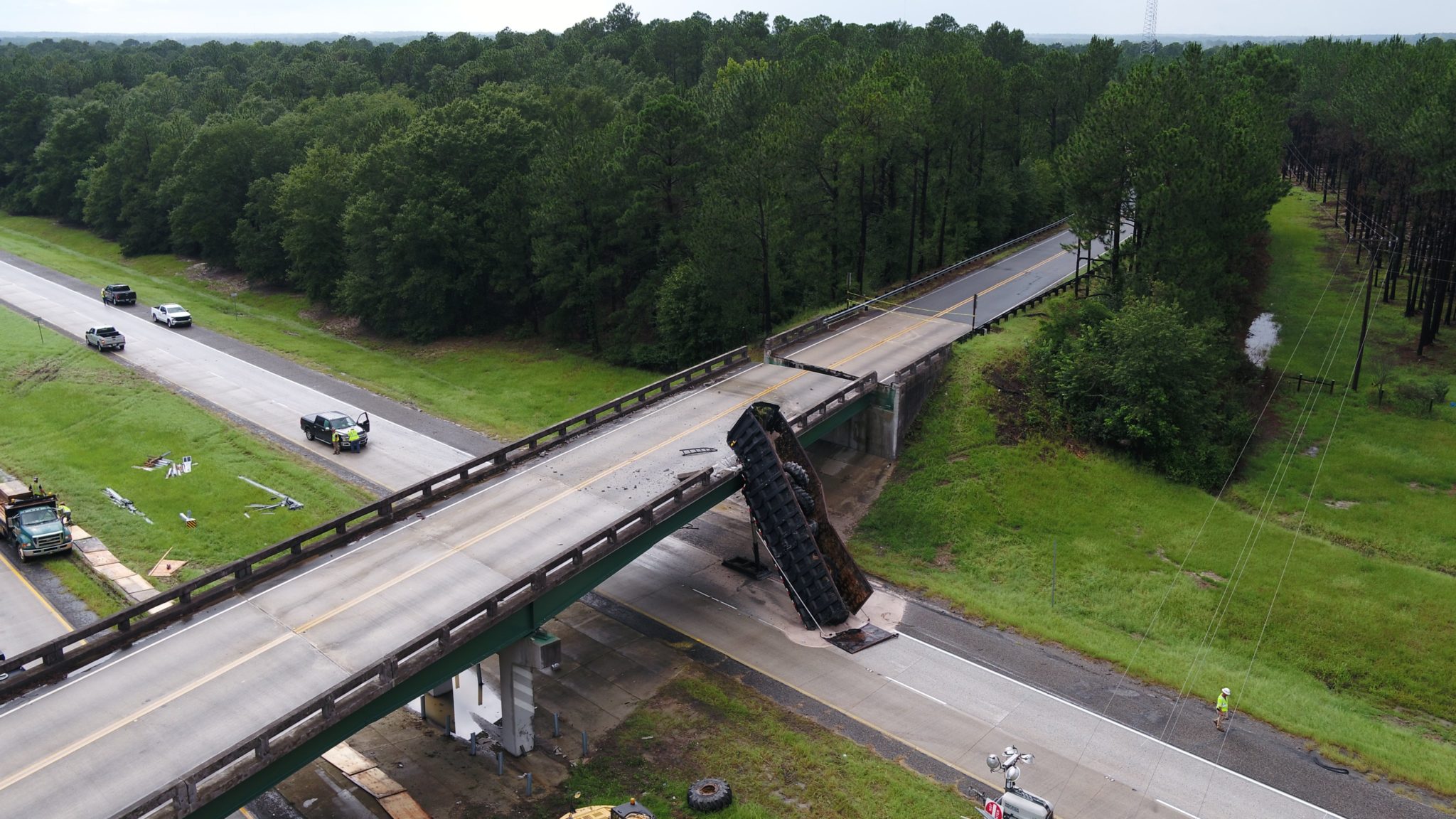 truck drives off overpass