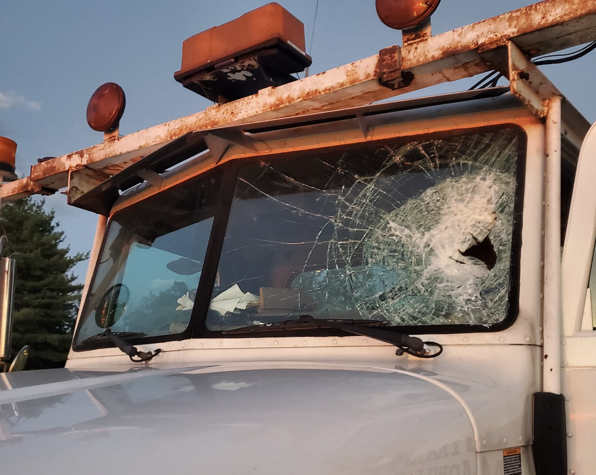 Trucker injured after object thrown from another vehicle shatters windshield