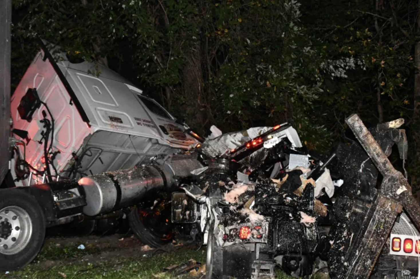 Drowsy trucker slams into tow truck driver, disabled motorhome